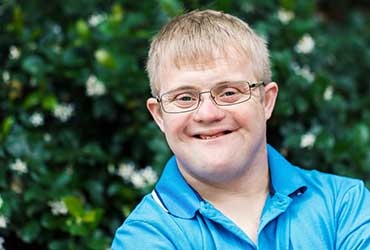 Personalised 24 hour Live-in Care services for people with learning disabilities, and other life-affecting conditions, or challenging behaviour. Young man with learning disability