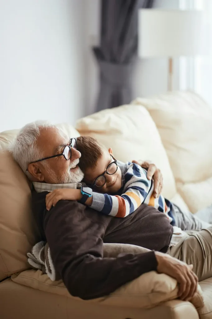 Grandad and grandson on the sofa